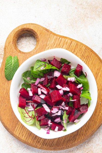 Beet salad beetroot onion lettuce ready to eat fresh portion dietary healthy meal food diet