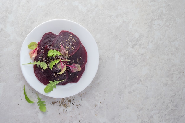 Beetroot carpaccio, a healthy food concept. A beautiful salad.Copy space.