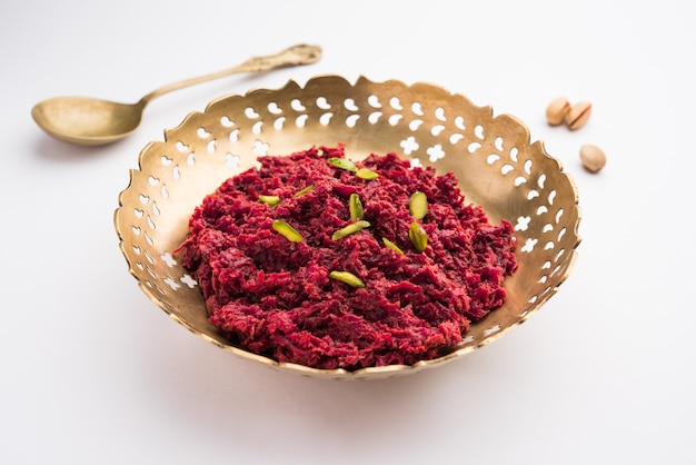 Beetroot halwa is a slow cooked Indian dessert made with grated beetroots milk sugar etc