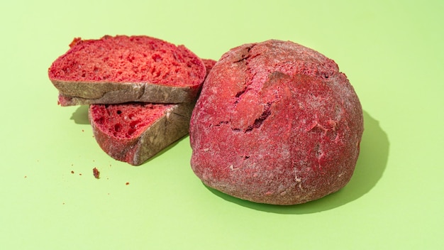 Beetroot purple buns on green background