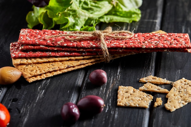 Beetroot and rye flour crackers with vegetables for making snacks. Vegetarianism and healthy eating