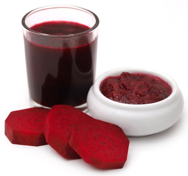 Beetroot with juice in a glass and smoothie in a bowl