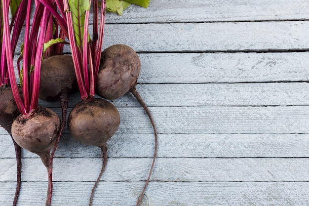 Beetroot on wooden background with copy space