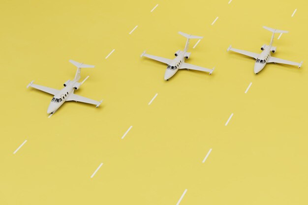 Foto l'inizio del viaggio in aereo aerei sulle piste dell'aeroporto su sfondo giallo