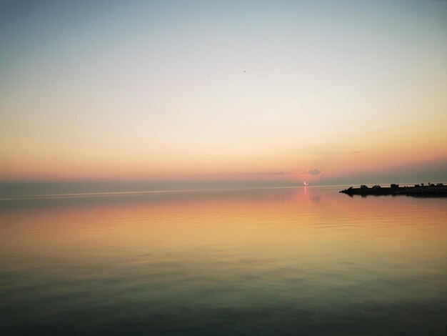 Photo the beginning of solar eclipse a wide view