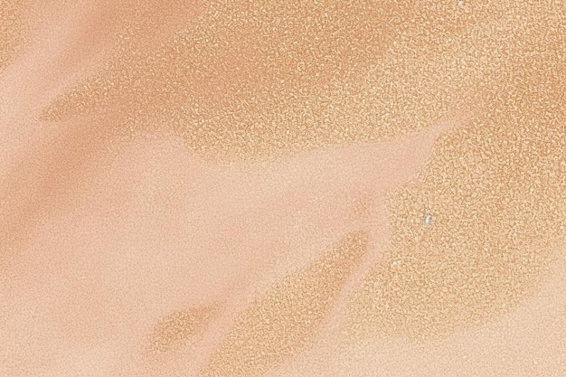 A beige background with a few small pebbles in the sand texture pattern