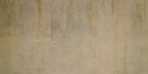 Beige betonnen muur oppervlak achtergrond textuur gips lichtbruin zand kleur in sjabloon header behang