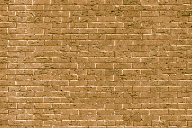 베이지색 벽돌 건물 벽입니다. 현대 다락방의 인테리어입니다. 디자인 배경