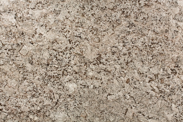 Beige and brown granite surface texture