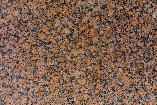 Beige brown granite  with black grain