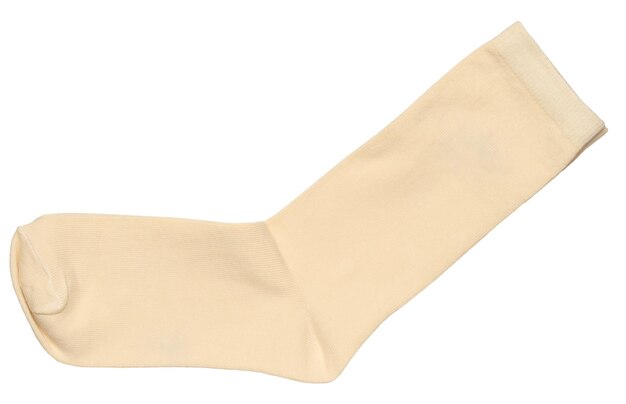 Photo beige cotton socks on isolated background