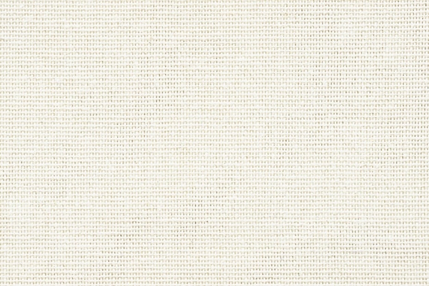 Beige fabric texture as background linen canvas with woven pattern