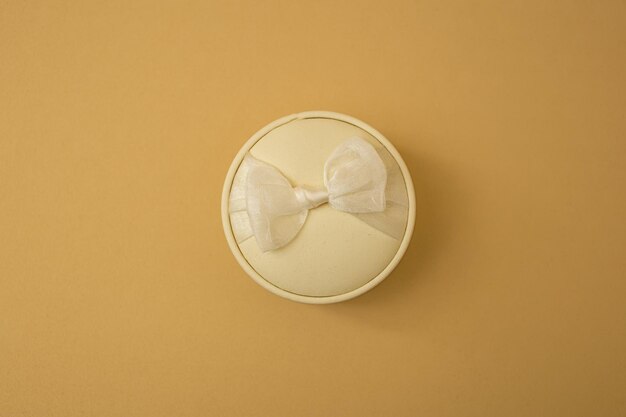 Beige jewelry box on beige background