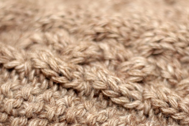 Beige knitted background medium thickness thread