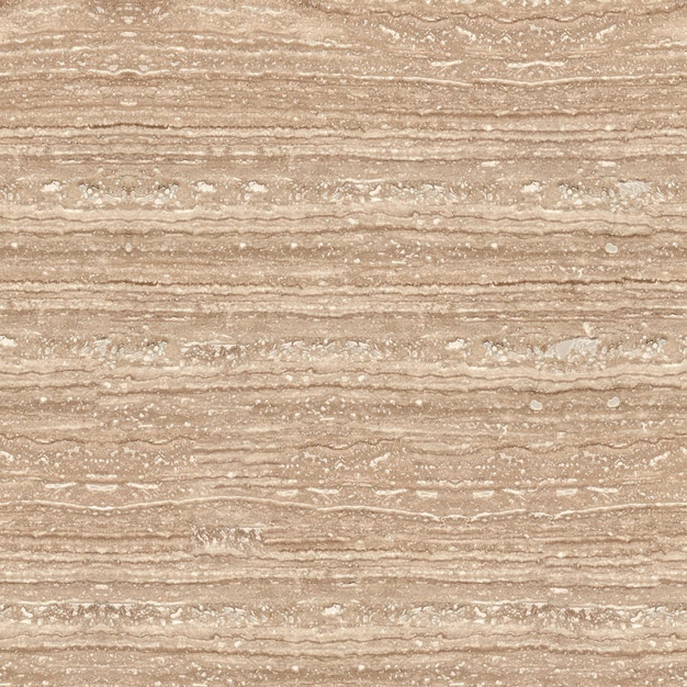 A beige marble wall with a rough texture.