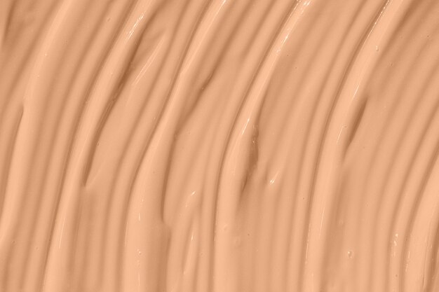 Beige nude vloeibare foundation textuur concealer uitstrijkje smudge drop make-up basiscrème getextureerd