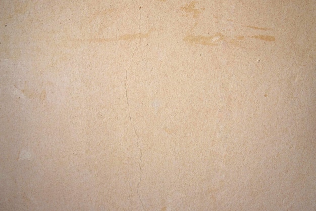 Beige old paper torn wallpaper background template blank