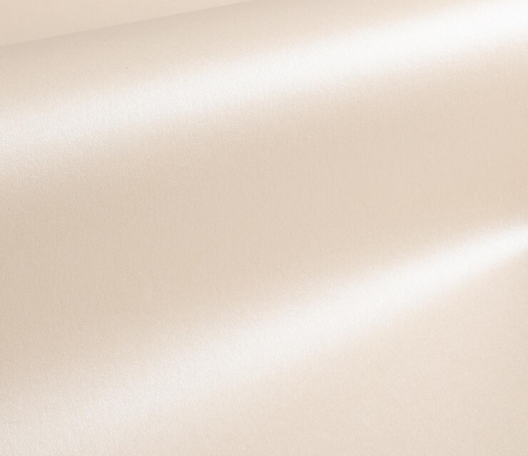 ベージュ色の紙は,滑らかな光沢があり,反射的な折りたたみがあります. 柔らかい柔らかさで優雅なミニマルな質感です.