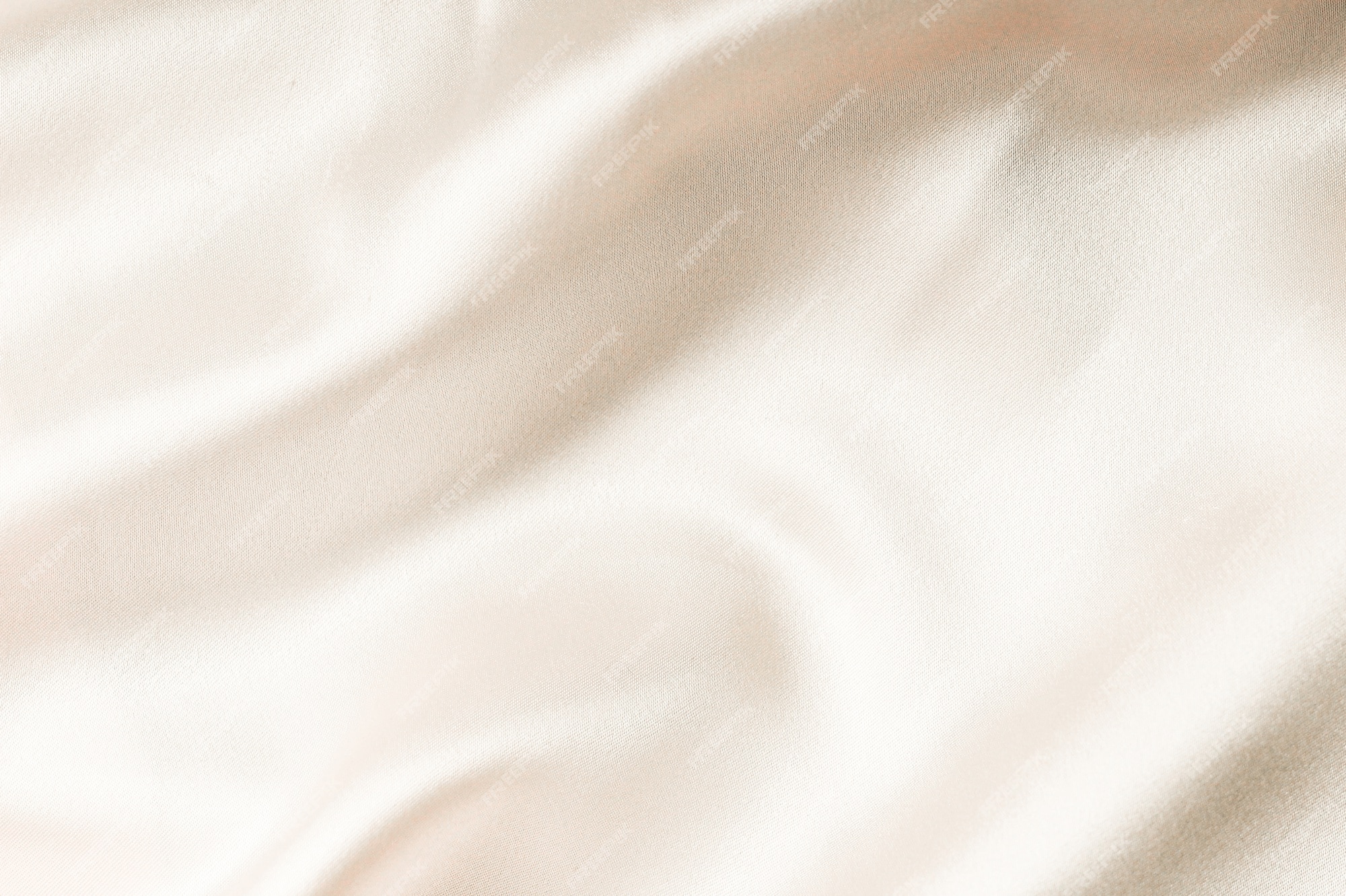 Premium Photo | Beige silk fabric texture