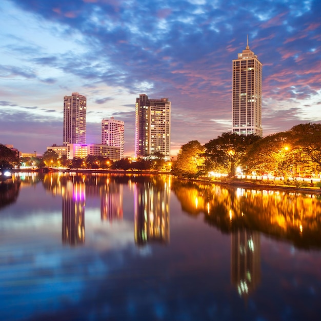 Beira lake and Colombo city skyline view at sunset. Beira lake is a lake in the center of the Colombo in Sri Lanka.