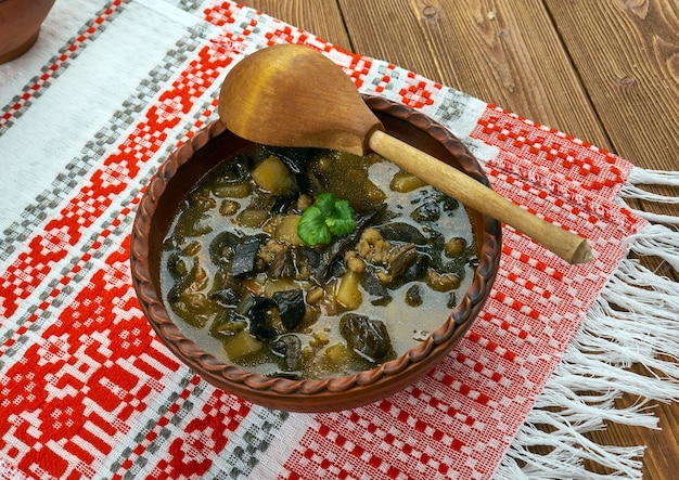 Belarusian mushroom soup with dried mushrooms and pearl barley