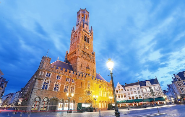 Belfry Tower in historical center of Bruges at night Belgium
