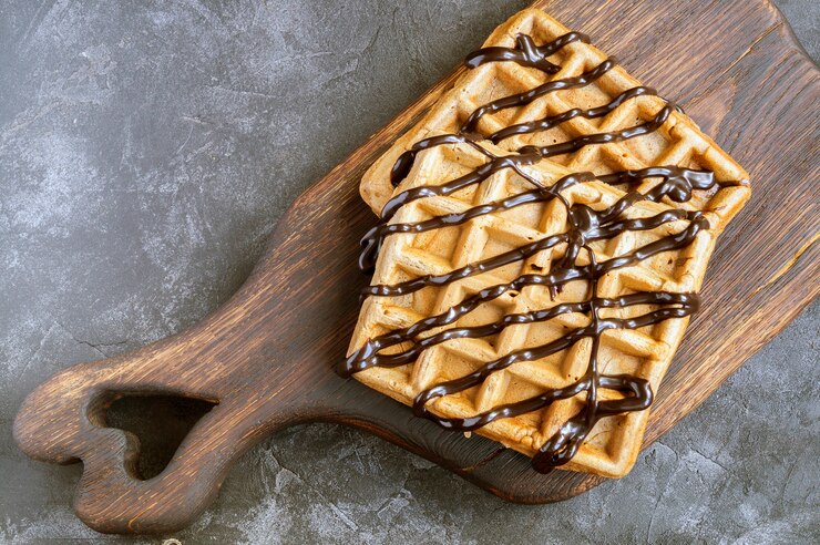 Belgian chocolate waffles with chocolate syrup.