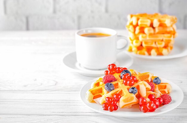 Belgian or viennese waffles european breakfast delicious sweet dish dessert snack view from above