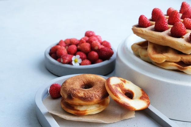 Belgian or Viennese waffles with strawberries 