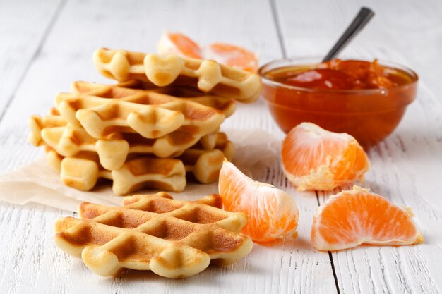 Belgian wafers with berries and ice cream in a plate