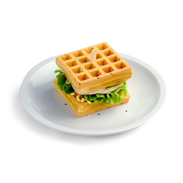 Belgian waffle sandwich with chicken lettuce tomato cheese and mayonnaise On a white background Isolated