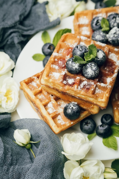 Belgian waffles with blueberries and mint