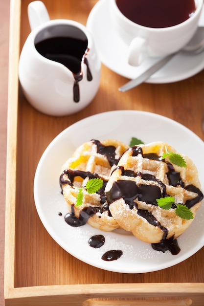 Belgian waffles with chocolate and powder sugar