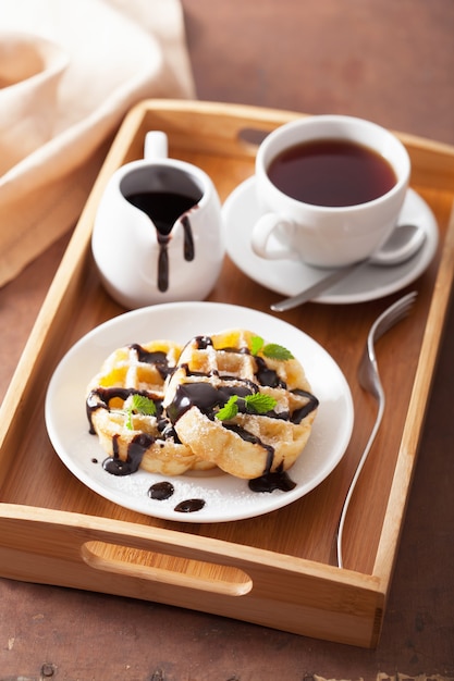 Belgian waffles with chocolate and powder sugar