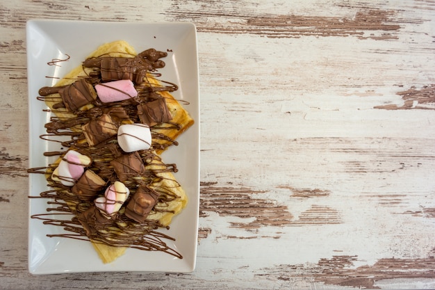 Foto waffle belgi con cioccolato