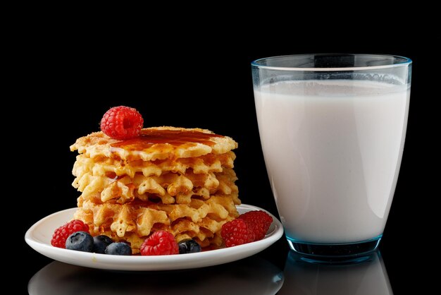 Belgian waffles with honey yogurt and berries