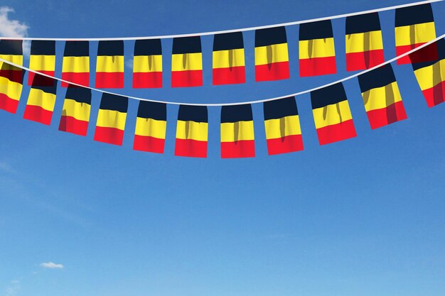 Belgische vlag feestelijke gors hangend tegen een blauwe lucht d render