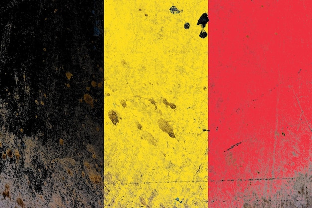 Belgium flag on a rustic concrete wall surface