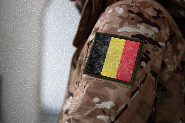 Belgium Soldier Soldier with flag Belgium Belgium flag on a military uniform Camouflage clothing