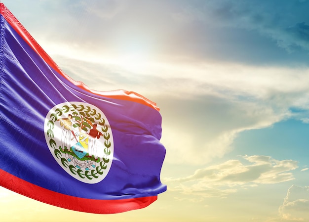 Belize national waving flag in beautiful sky