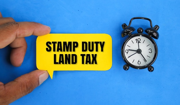 belklok en gespreksbel met het woord Stamp Duty Land Tax of de letters SDLT