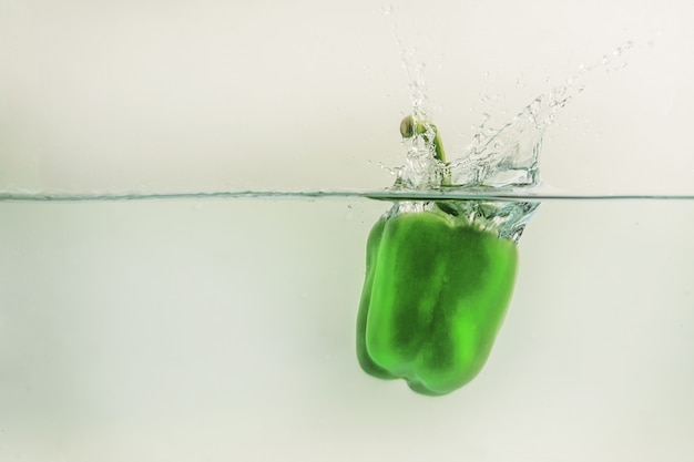 Bell pepper  falls in water