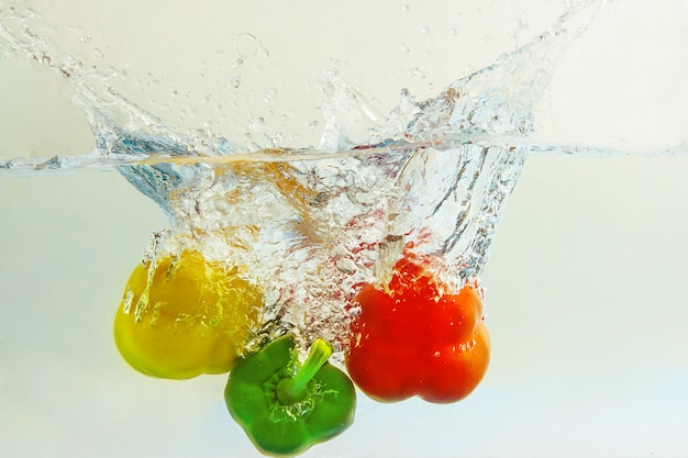 Bell pepper  falls in water 