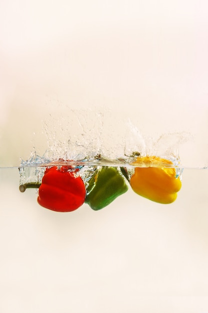 Bell pepper  falls in water 