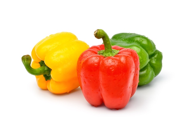 Bell peppers with water droplets isolated on white surface