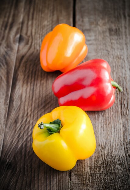 Bell peppers on the wooden table