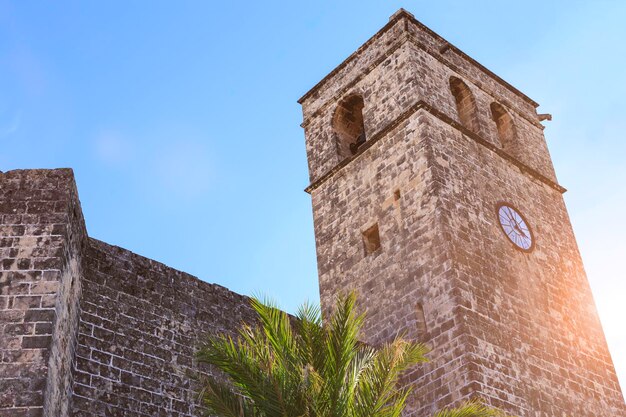 The bell tower of Saint Bartholomew church in the old town of Xabia, also known as Javea, in Spain.