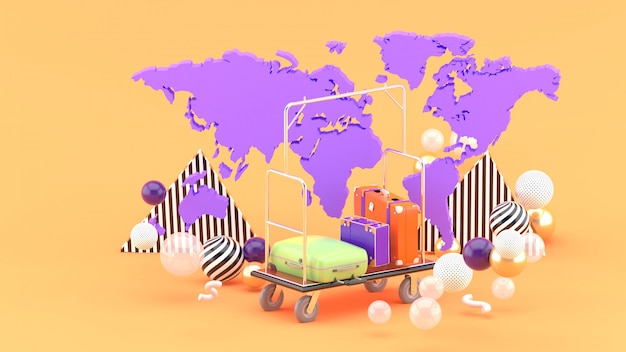 Photo bellboy trolley among the world map and colorful balls on the orange. 3d rendering.