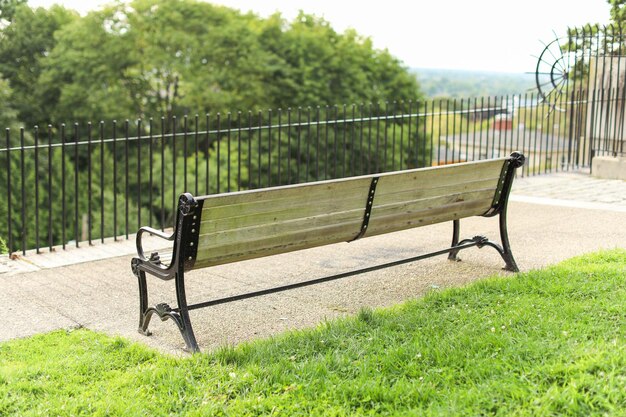 bench amidst bustling city symbolizes solitude reflection urban respite and shared moments of c