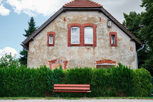 Bench for resting before old house facade